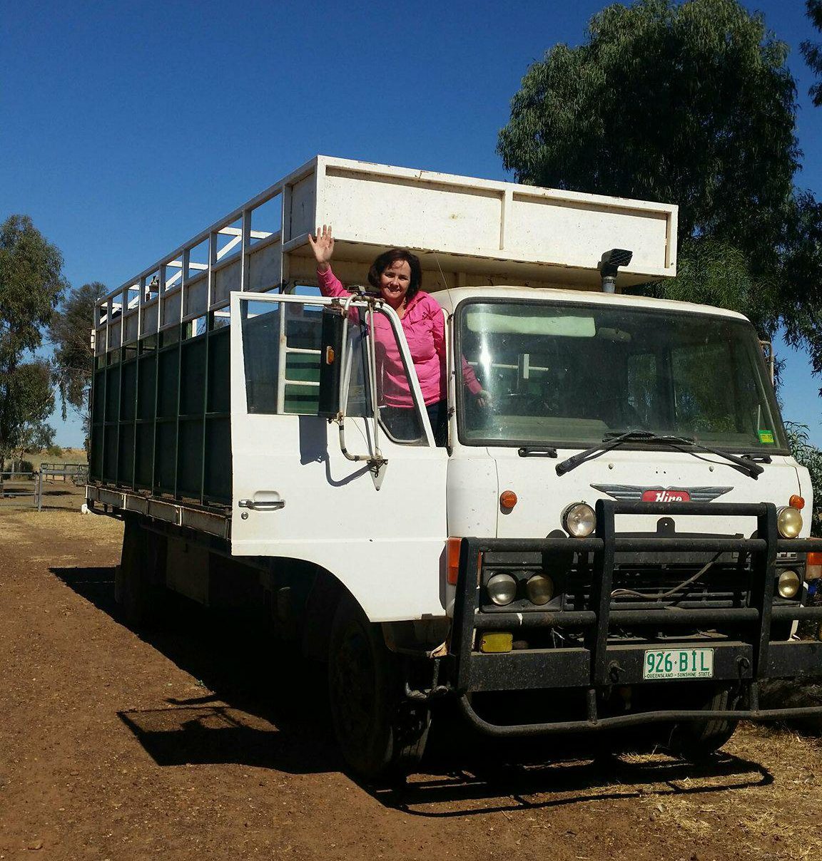 lady farmer and her cattle truck