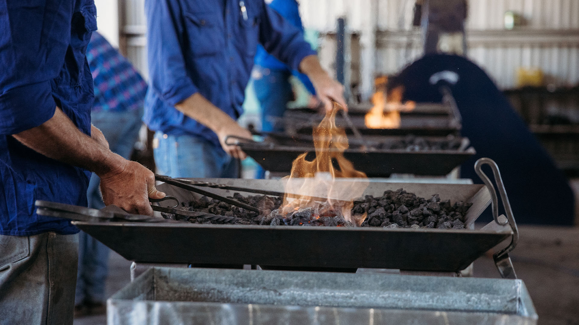 Lit coals at the farmers forge