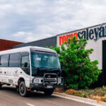 A 4WD mini-bus parked in front of the Roma Saleyards
