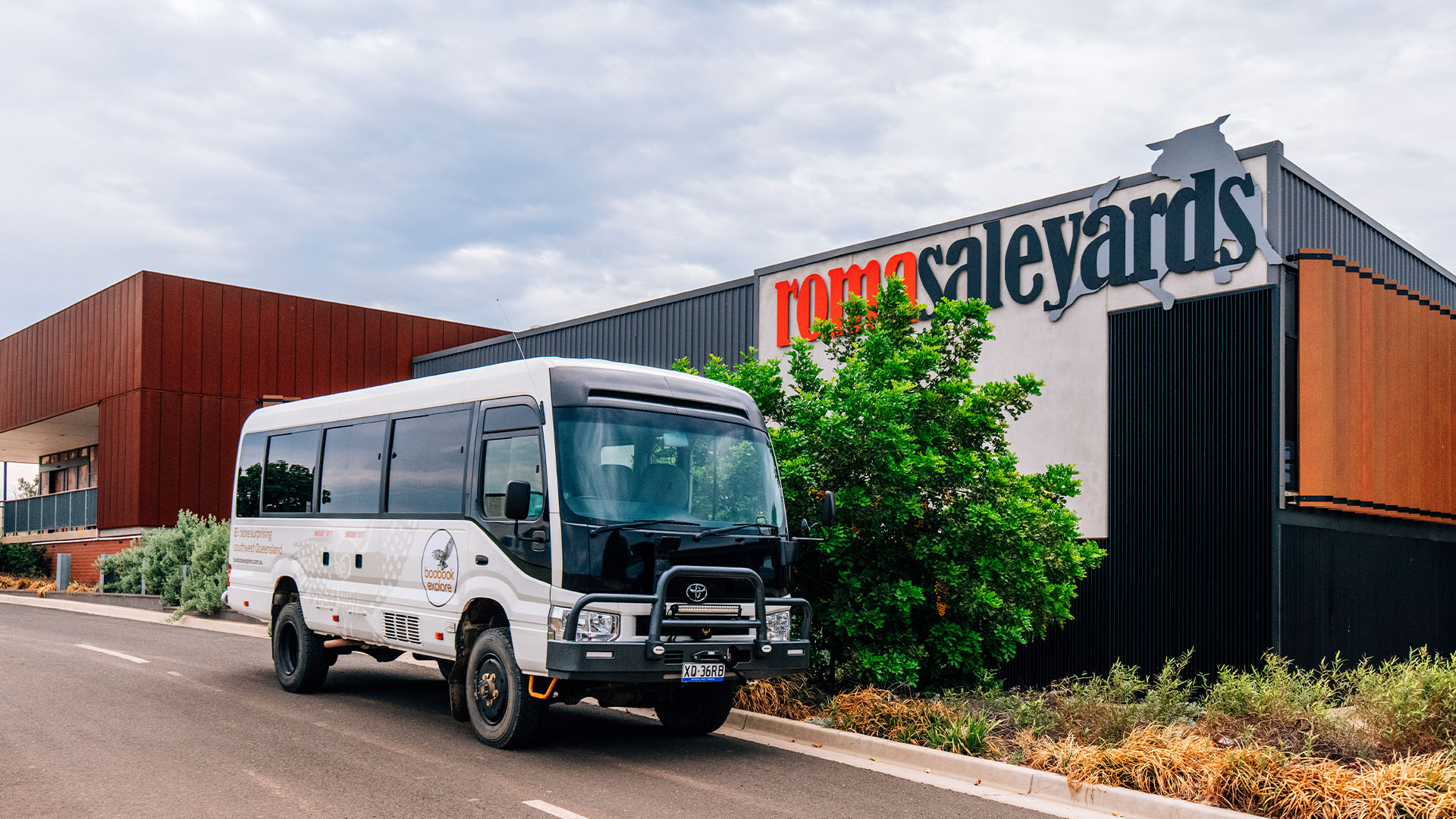A 4WD mini-bus parked in front of the Roma Saleyards