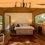 Queen bedroom inside glamping tent