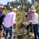 Group of people in Australian bush setting