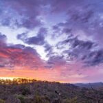 Pink and purple cloudy sunset over the Carnarvon Ranges