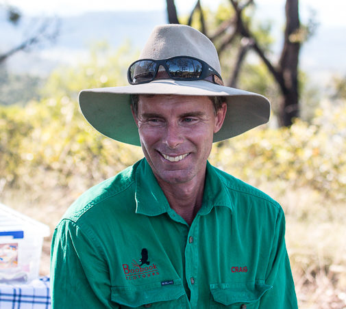 guy smiling laughing outdoors nature ecologist