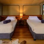 Twin beds in glamping tent