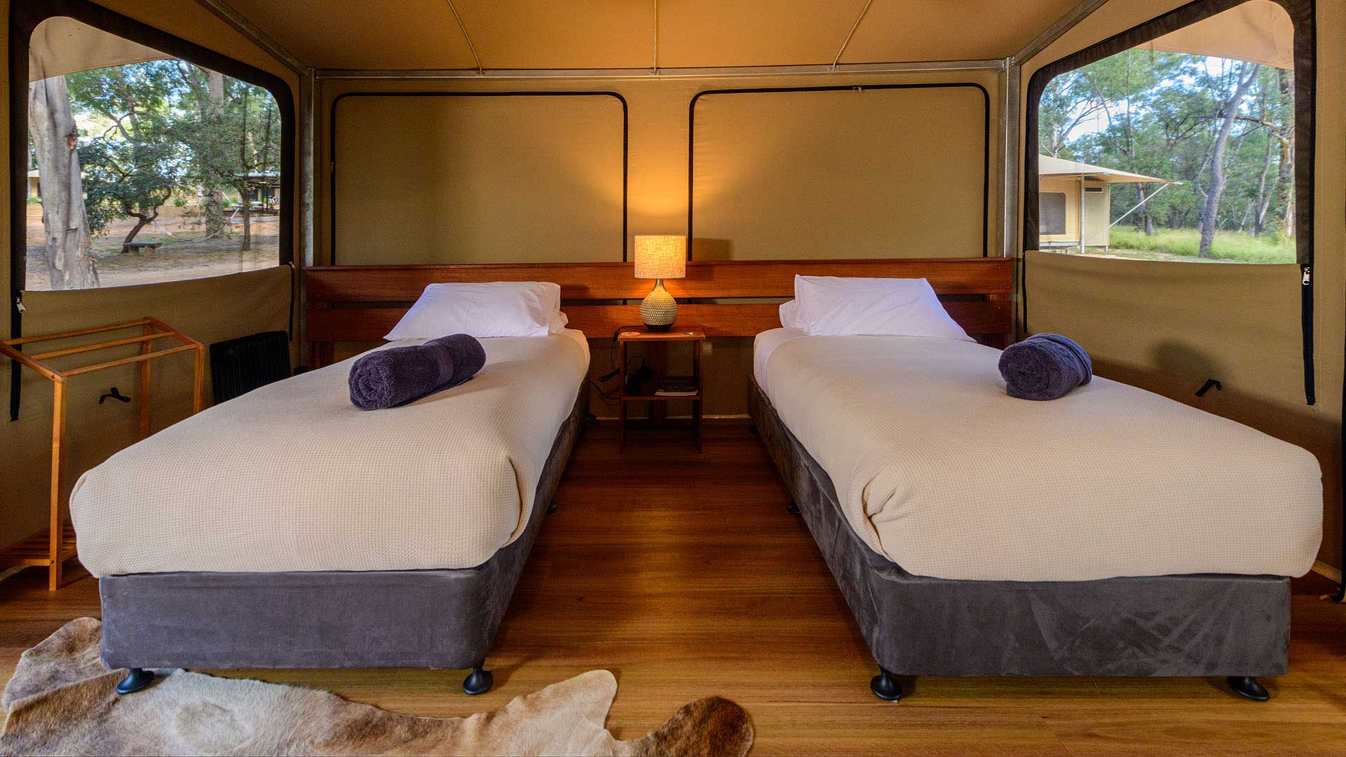 Twin beds in glamping tent